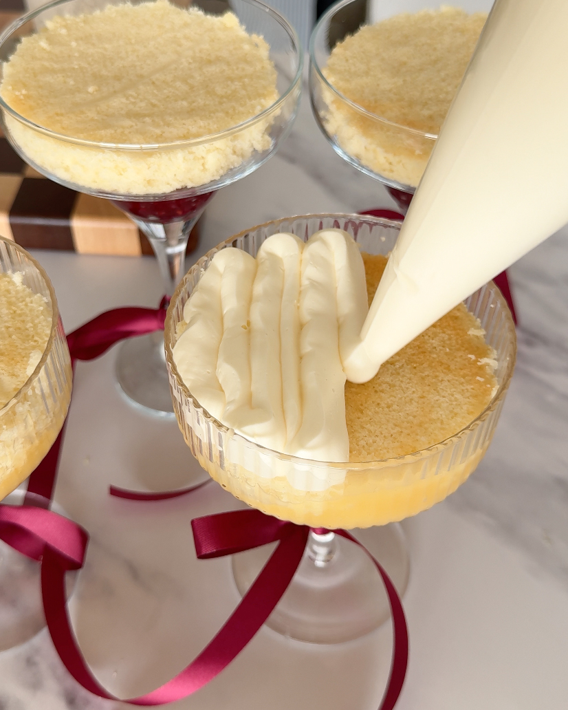 Piping buttercream in glass