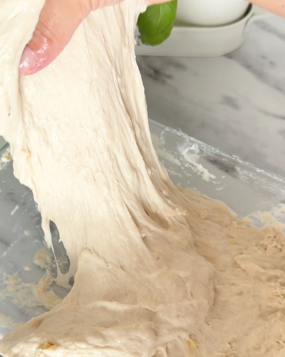 stretching focaccia dough